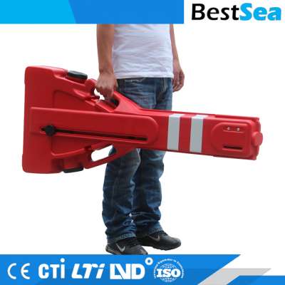 Water filled expandable barrier red, durable plastic water barrier